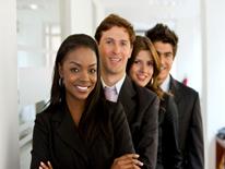 Information Technology Staff Augmentation (ITSA) opportunities Group of business people standing and smiling while looking at the camera